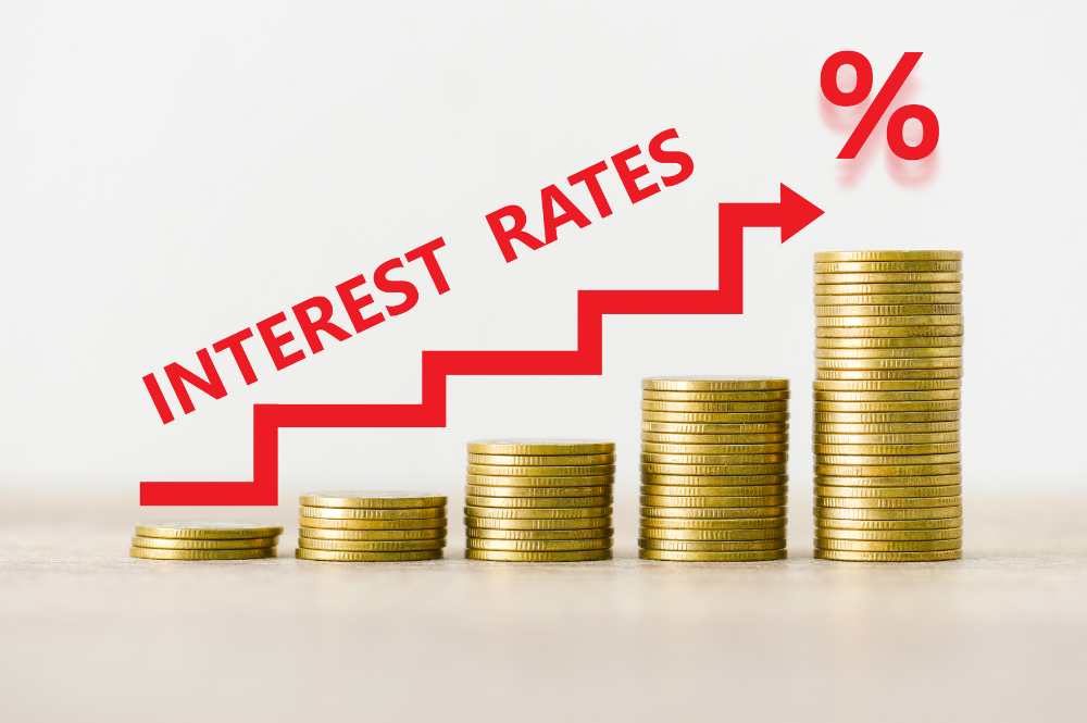 A visual representation showing how rising interest rates affect stock market trends and investor behavior.