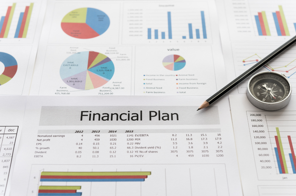 Financial plan on paper with a pen and calculator, illustrating an adaptable approach to budgeting and financial management.